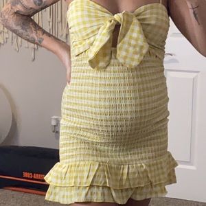 LAY LOW SMOCKED GINGHAM TIE FRONT DRESS - MUSTARD